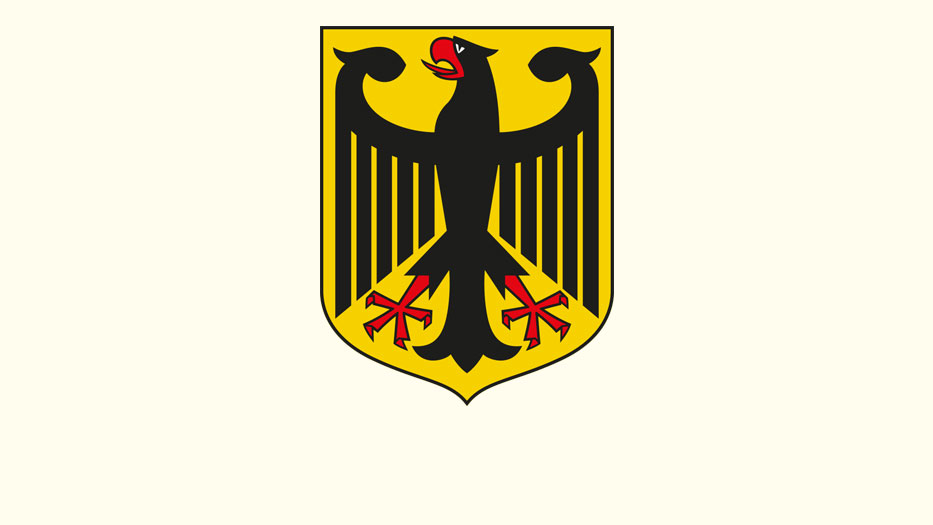 Das Bundeswappen zeigt auf gelben Grund den einköpfigen schwarzen Adler mit rotem Schnabel und Fängen.