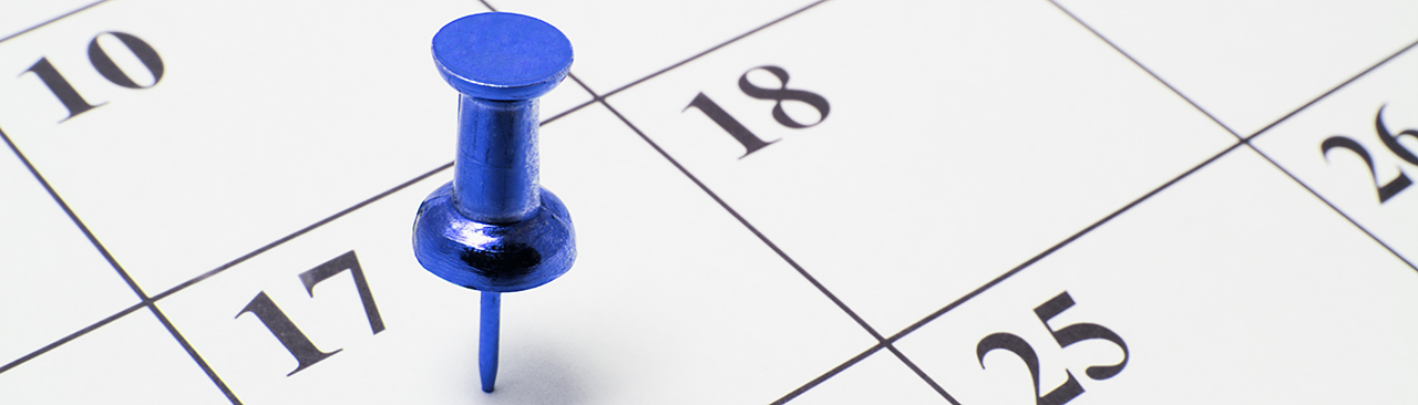 Calendar with a blue pin
